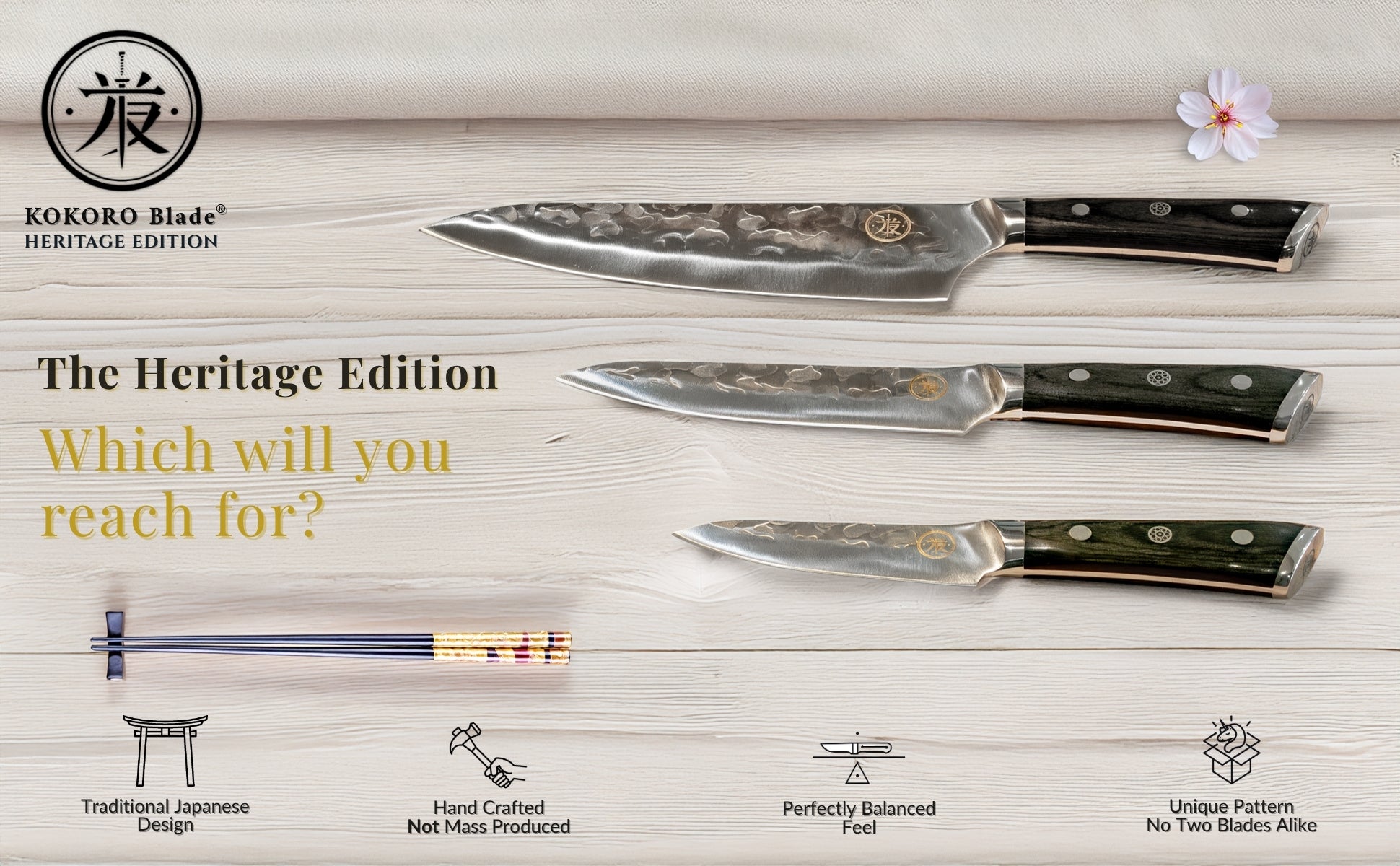Three Japanese-style kitchen knives from the KOKORO Blade Heritage Edition displayed on whitewashed wood, showcasing traditional design and premium craftsmanshi